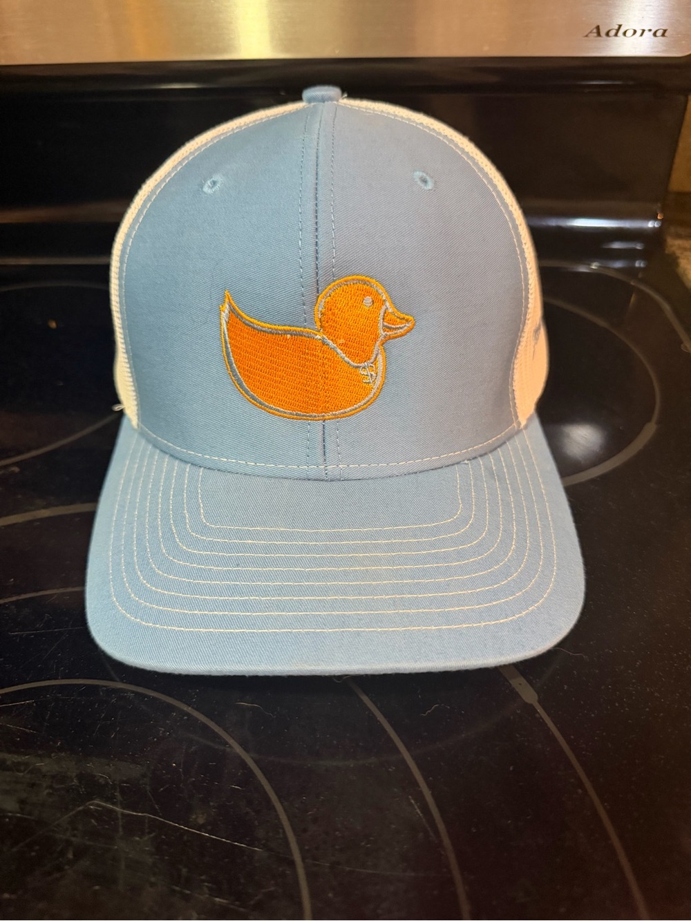 Light Blue Trucker Hat with Orange Duck Logo - Unbranded